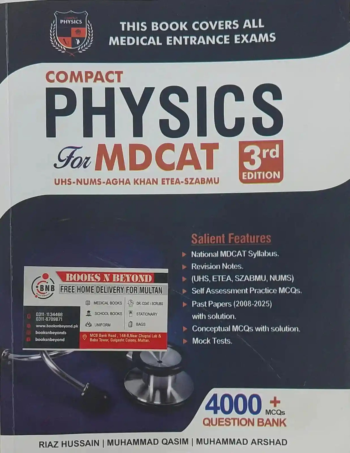 Book titled 'Compact Physics for MDCAT' on a dark background