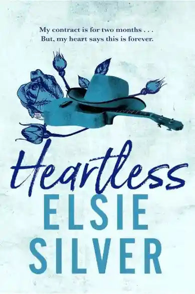 Book cover of 'Heartless' by Elsie Silver with a cowboy hat and roses on a light blue background.